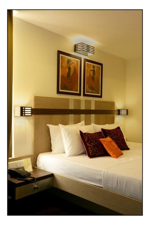Hotel Utsav Deluxe Pune Værelse billede