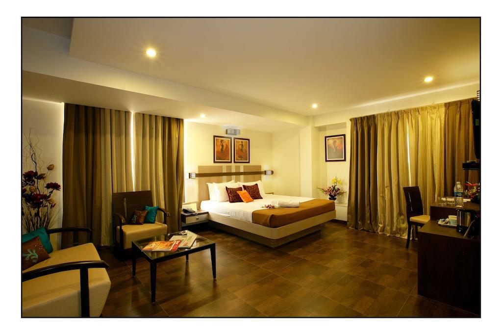 Hotel Utsav Deluxe Pune Værelse billede