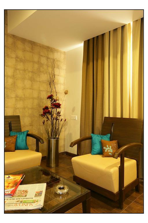 Hotel Utsav Deluxe Pune Værelse billede